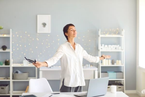 Woman taking a deep breath